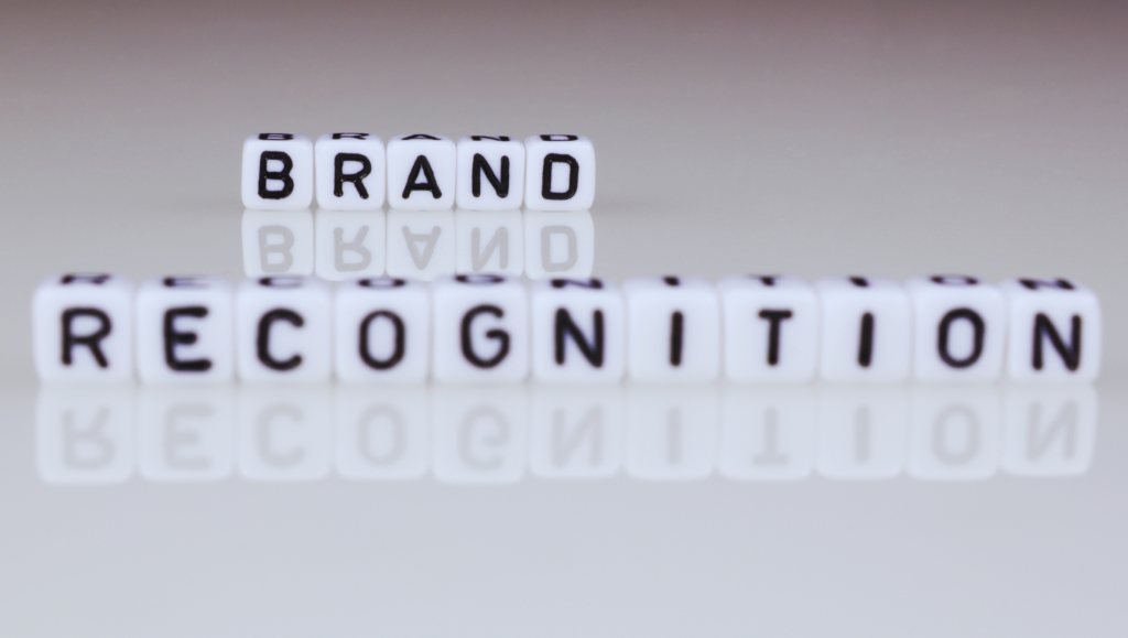 die forming the words brand recognition